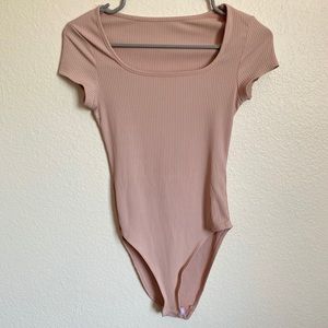 Tight Pink Bodysuit